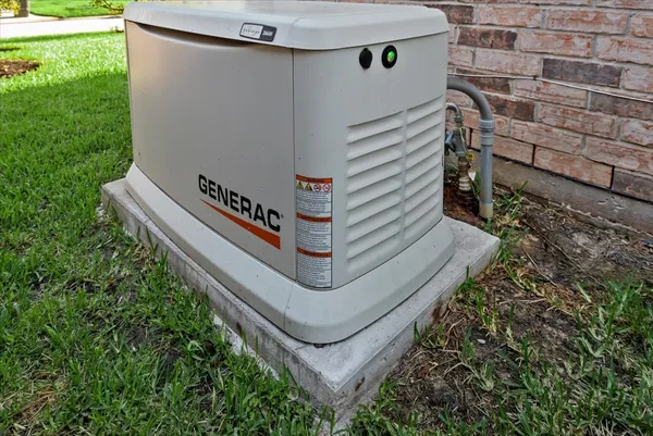 an aerial view of a house with outdoor space