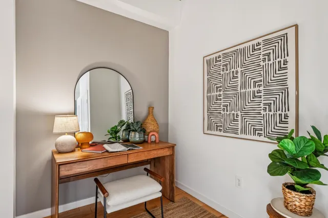 a view of a workspace with a potted plant