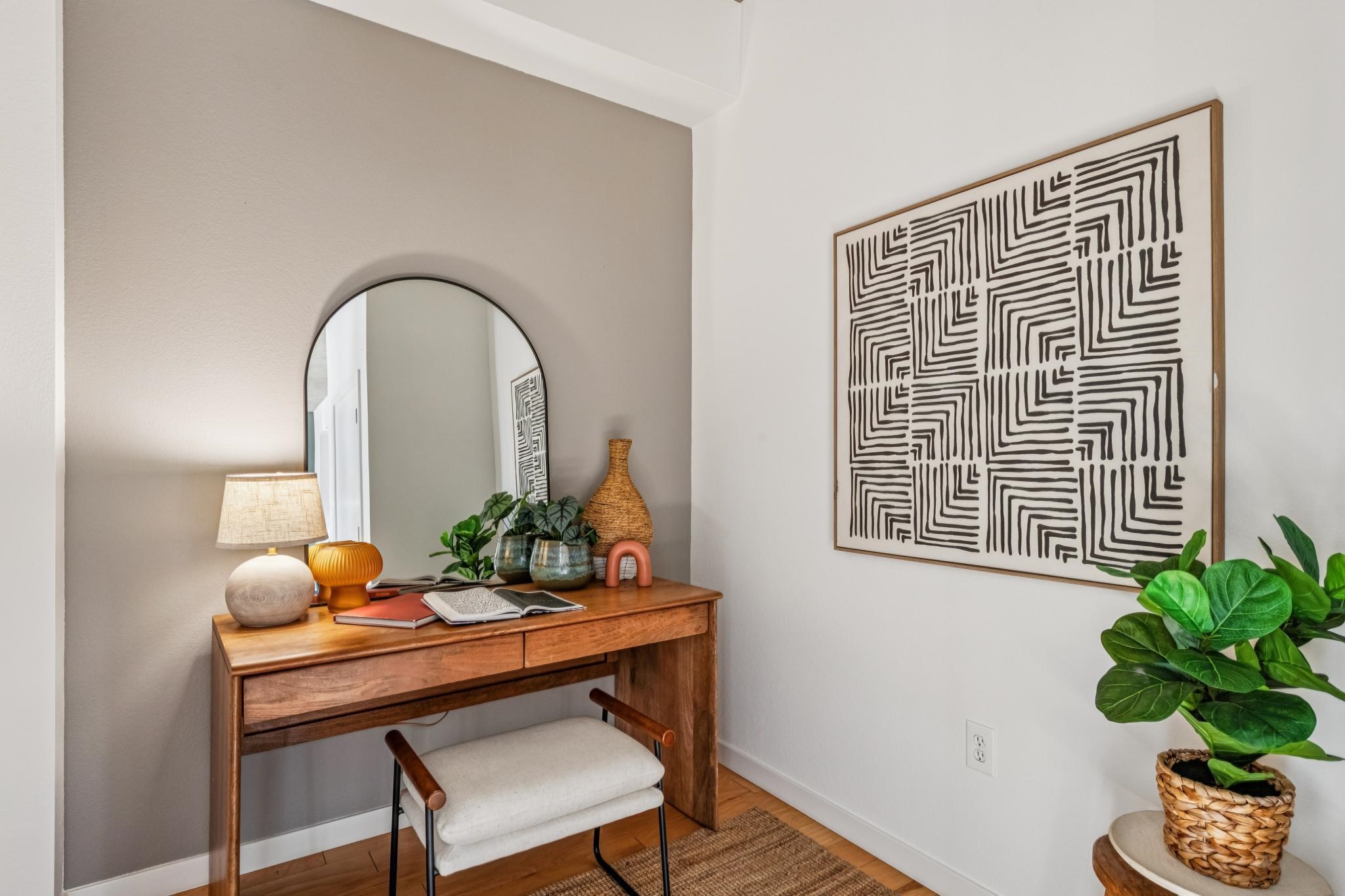 288 3rd Street, Unit 406 Oakland, CA 94607 - Photo 14 of 32 a view of a workspace with a potted plant