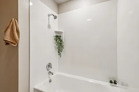 a bathroom with a bathtub