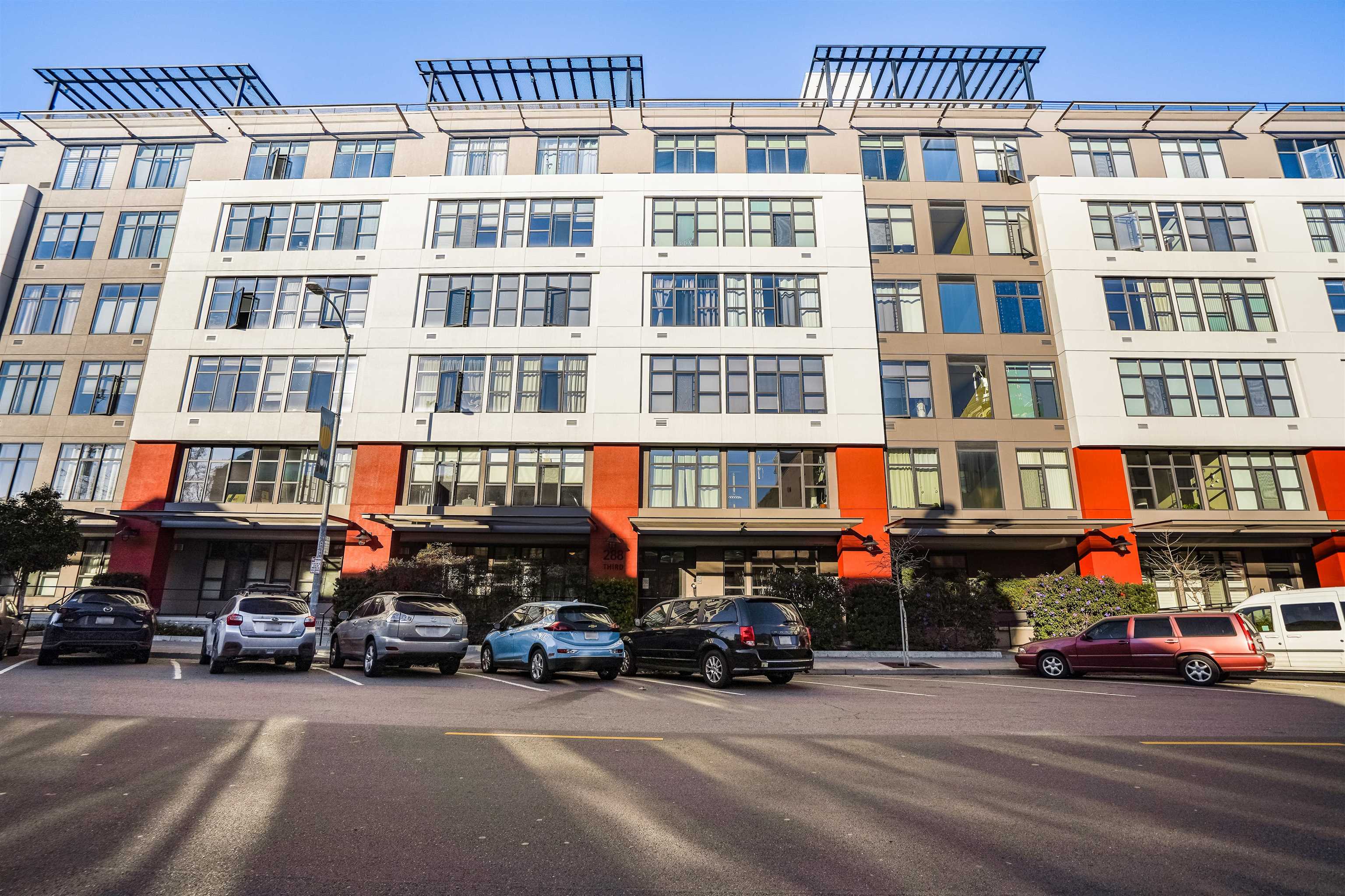288 3rd Street, Unit 406 Oakland, CA 94607 - Photo 30 of 32 a view of a street with cars and a building