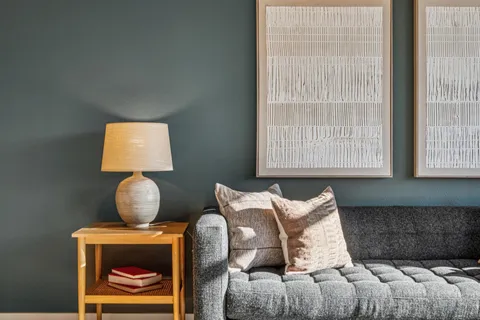 a bedroom with bed and a window