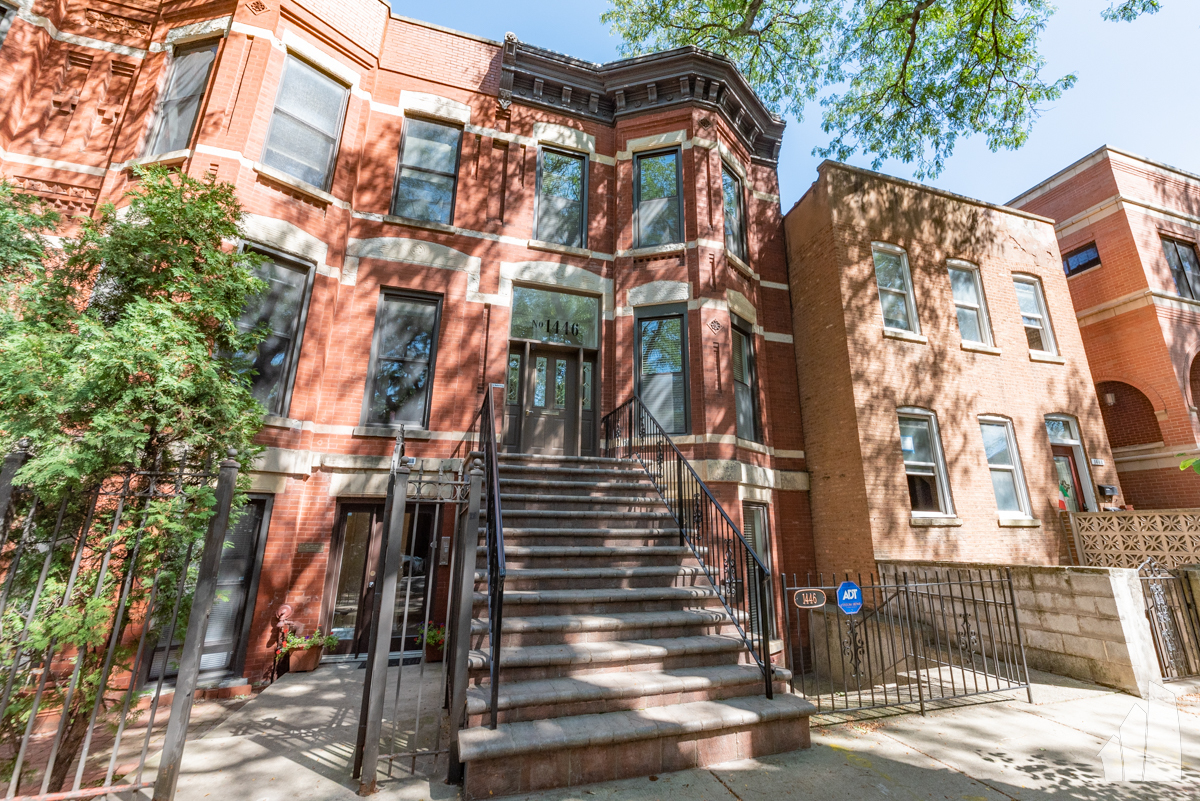 a view of a house with a street