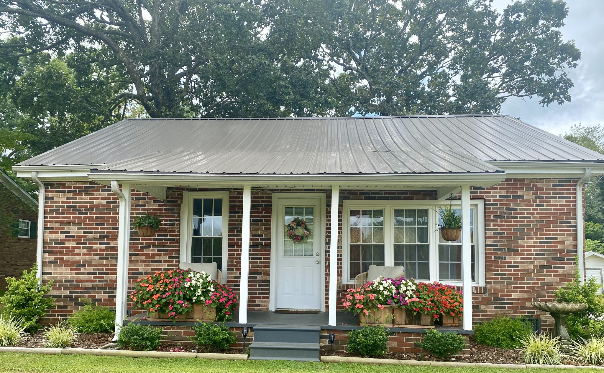 front view of a house with a yard