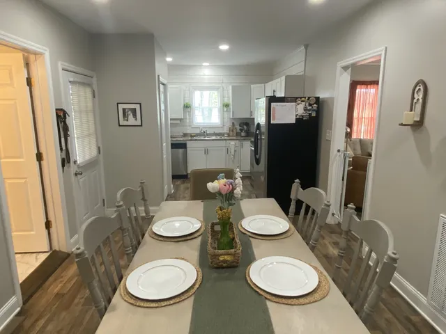 a view of a dining room with furniture