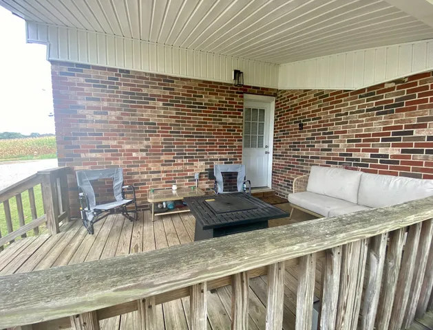 a view of a balcony with chairs