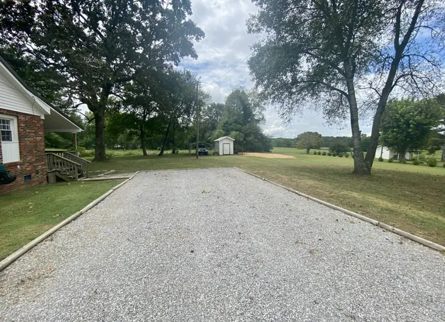 a living room with furniture fireplace and a flat screen tv