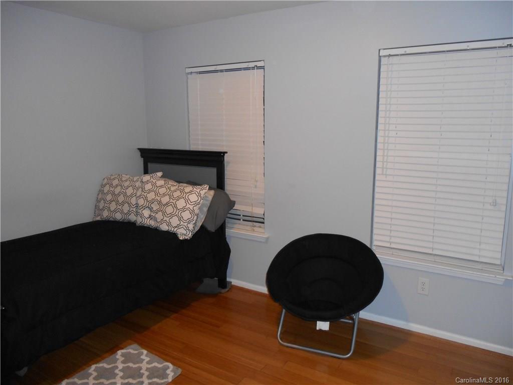 808 Valley Ridge Road Charlotte, NC 28214 - Photo 12 of 19 a living room with furniture