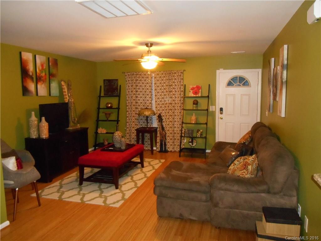 808 Valley Ridge Road Charlotte, NC 28214 - Photo 7 of 19 a living room with furniture