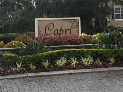 14226 Fredricksburg Drive, Unit 212 Orlando, FL 32837 - Photo 1 of 32 a sign that is on the side of the road