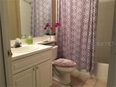 a bathroom with a sink and toilet
