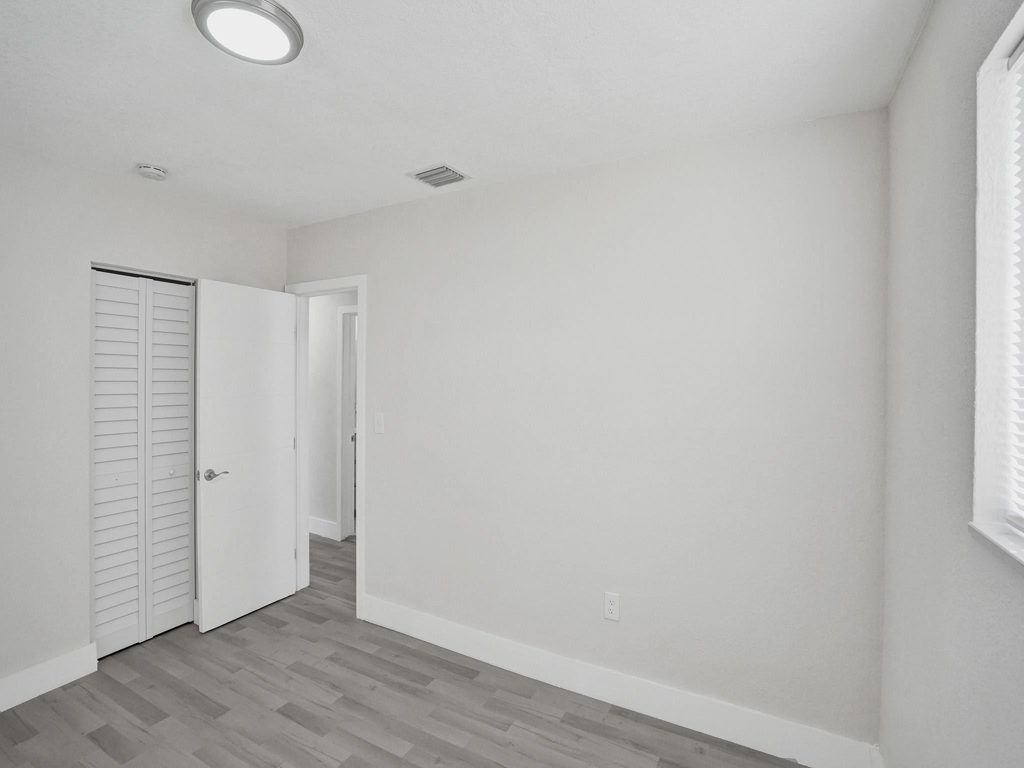 631 North 69th Terrace Hollywood, FL 33024 - Photo 23 of 60 a view of an empty room with wooden floor