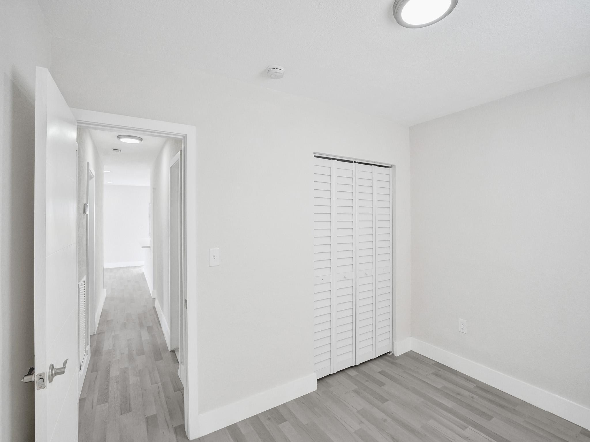 631 North 69th Terrace Hollywood, FL 33024 - Photo 28 of 60 a view of an empty room with wooden floor