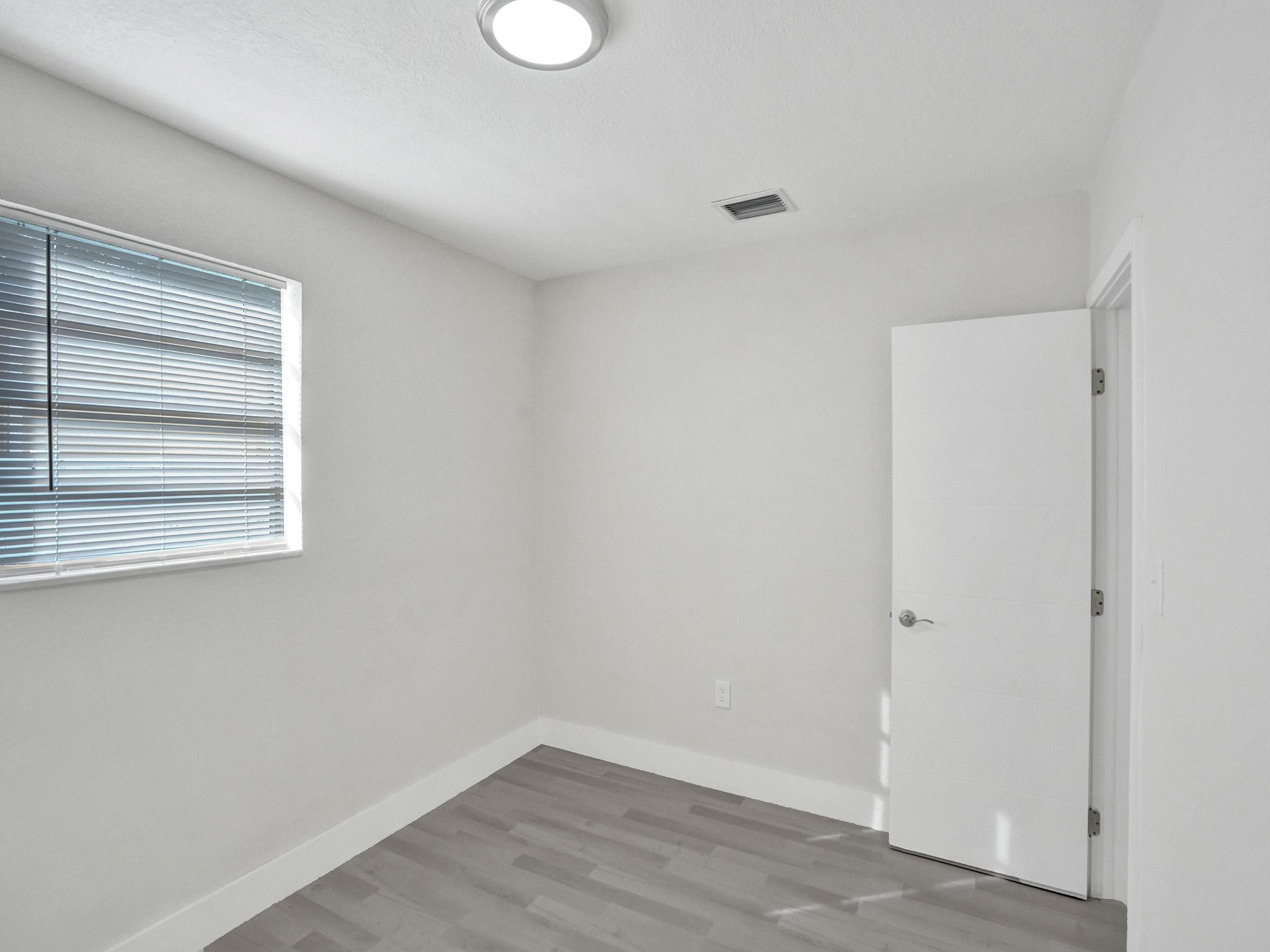 631 North 69th Terrace Hollywood, FL 33024 - Photo 32 of 60 a view of a room that has a window in it