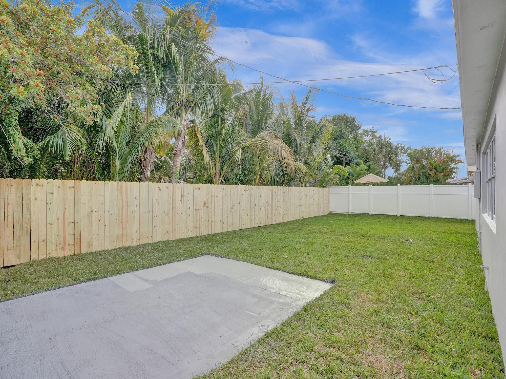 631 North 69th Terrace Hollywood, FL 33024 - Photo 56 of 60 a view of yard with trees in the background