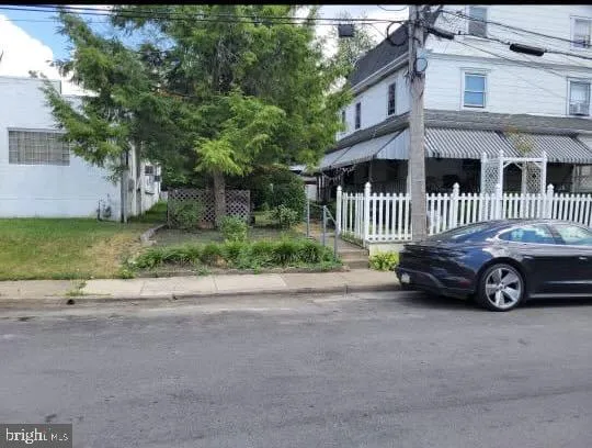 a car parked in front of a house