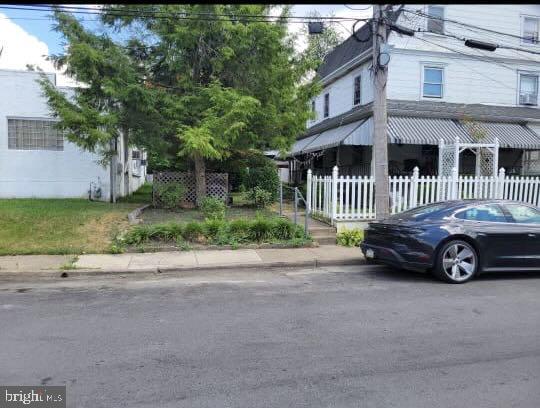 a car parked in front of a house