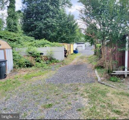 1921 Fairview Avenue Willow Grove, PA 19090 - Photo 2 of 10 a backyard of a house with outdoor seating and trees