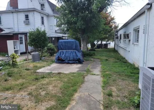 a view of a back yard of the house