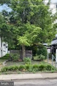 a view of a wooden fence