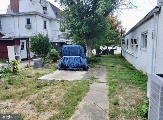 a house view with a garden space