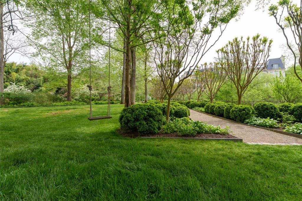 2288 Peachtree Road Northwest, Unit 4 Atlanta, GA 30309 - Photo 39 of 50 a view of a backyard with large trees