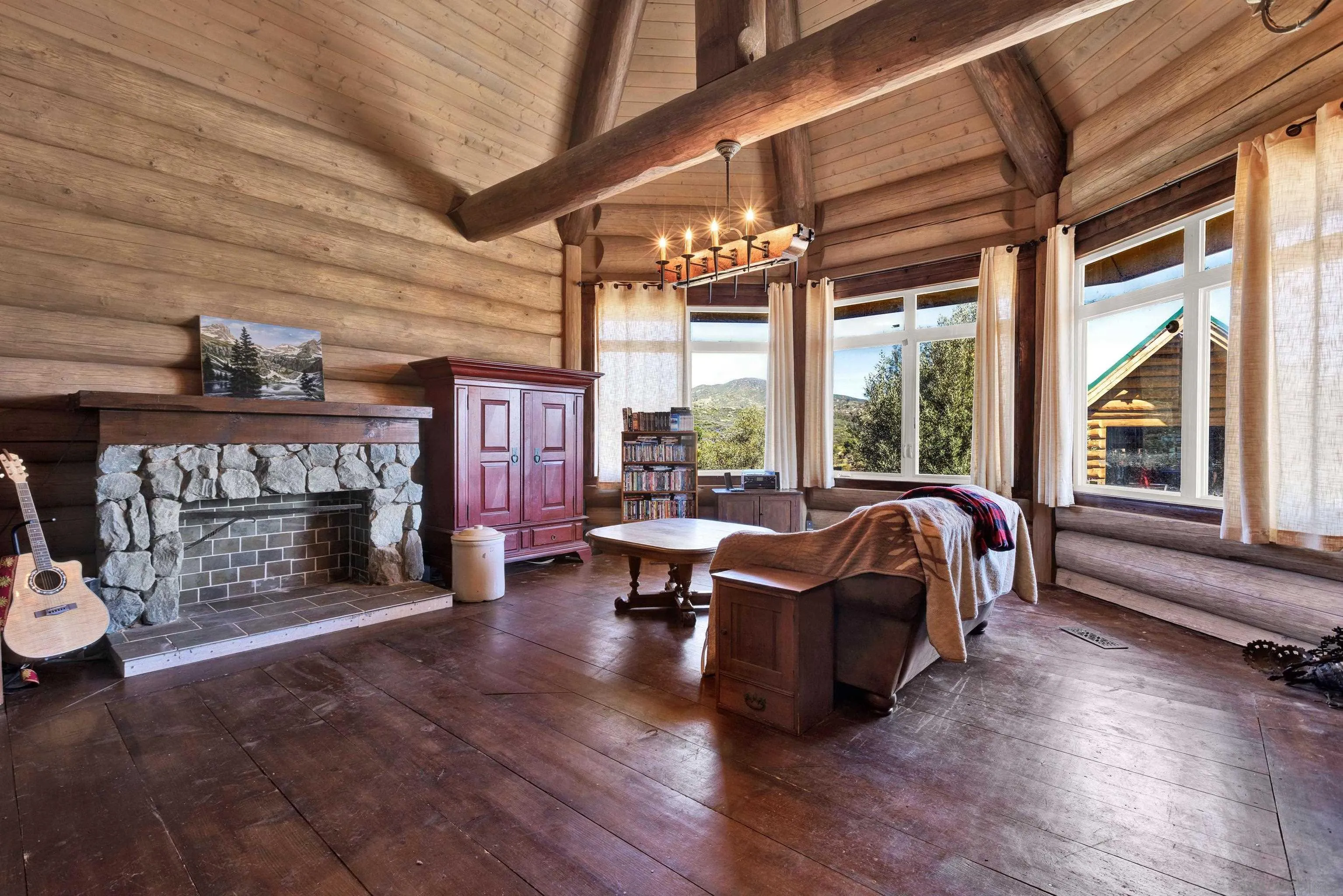 20580 Bexley Road Jamul, CA 91935 - Photo 11 of 50 a bed room with furniture and a fireplace