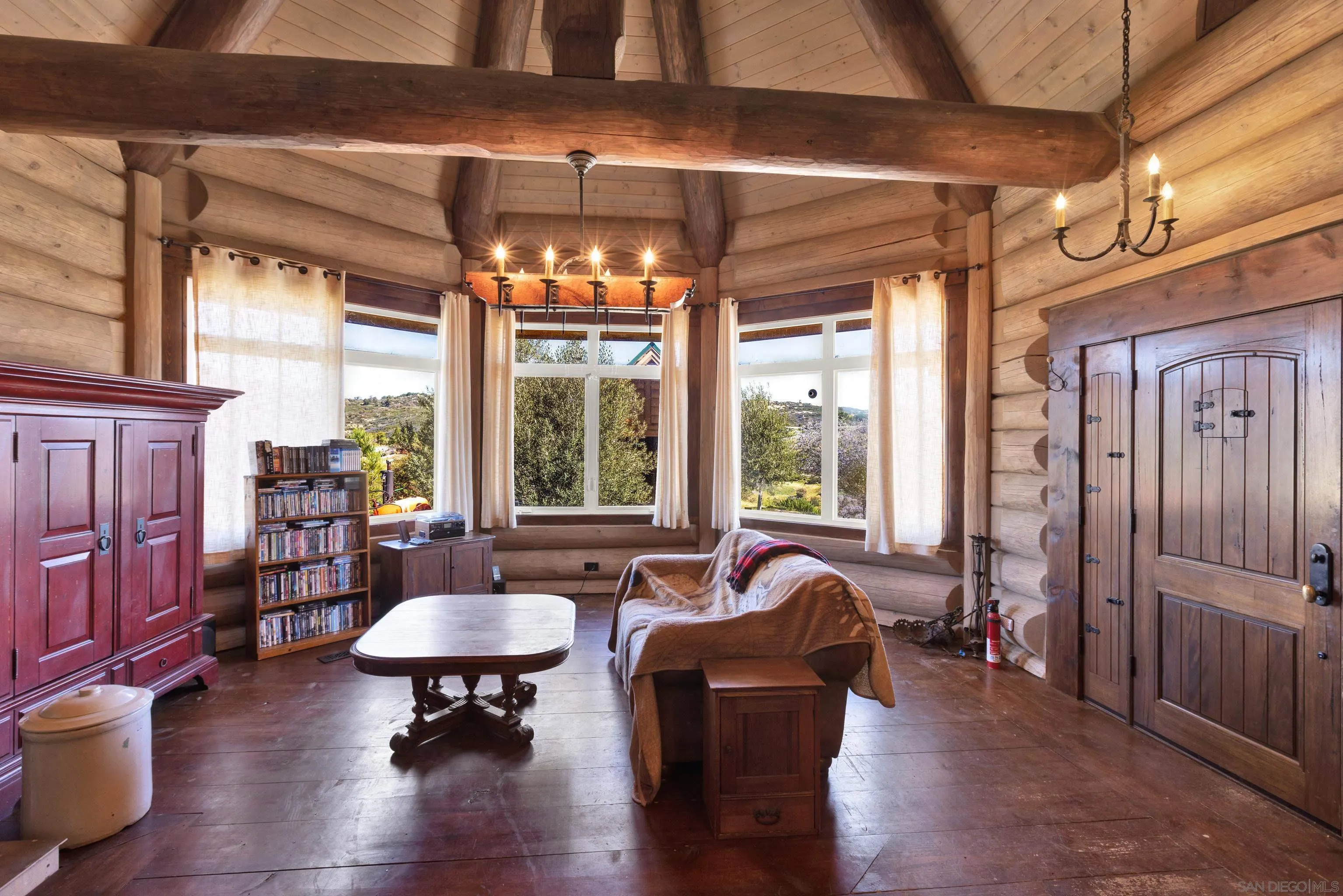 20580 Bexley Road Jamul, CA 91935 - Photo 13 of 50 a living room with furniture and a chandelier
