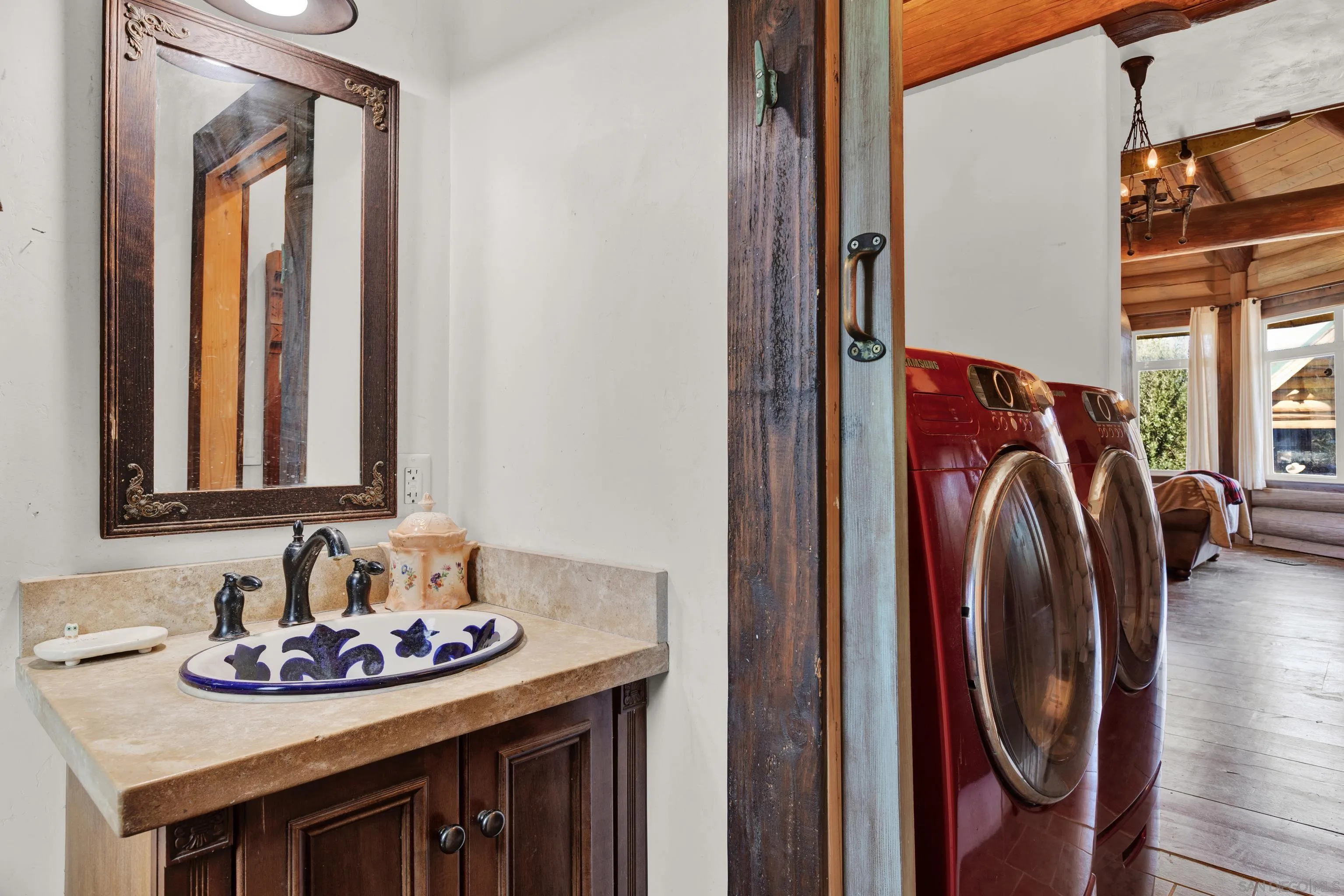 20580 Bexley Road Jamul, CA 91935 - Photo 21 of 50 a view of a sink and a livingroom with furniture