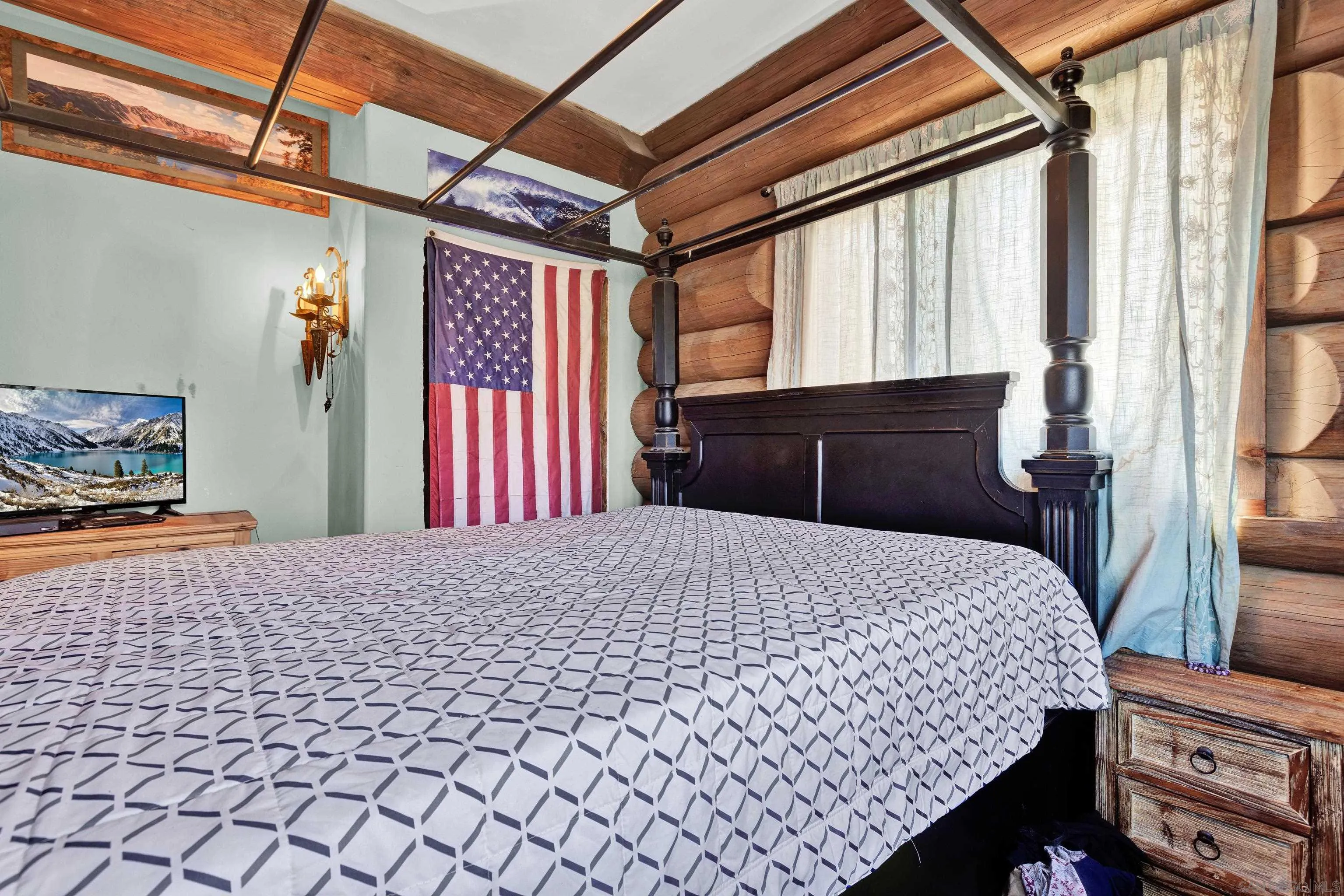 20580 Bexley Road Jamul, CA 91935 - Photo 25 of 50 a bedroom with a bed and window