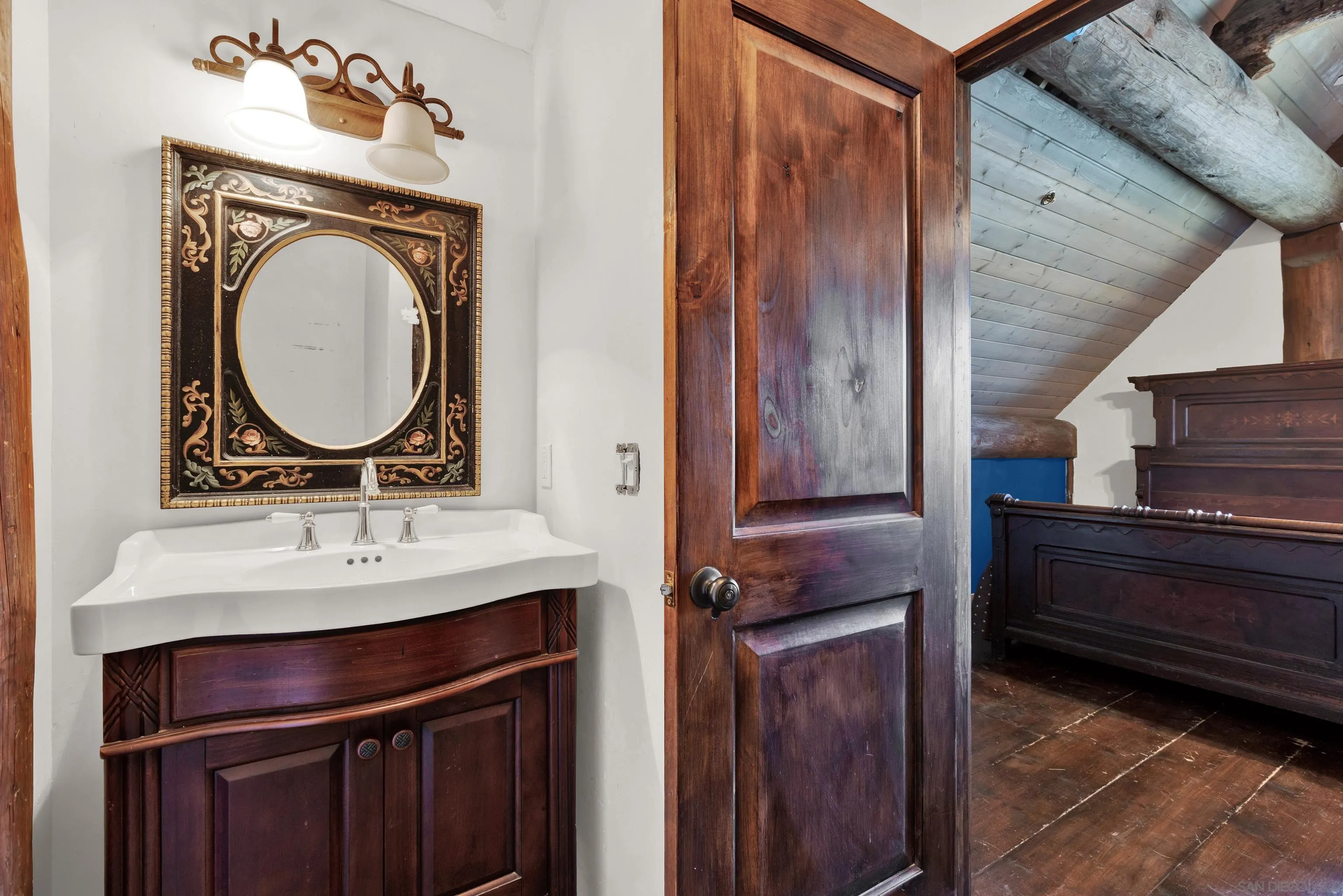 20580 Bexley Road Jamul, CA 91935 - Photo 40 of 50 a bathroom with a sink and a mirror