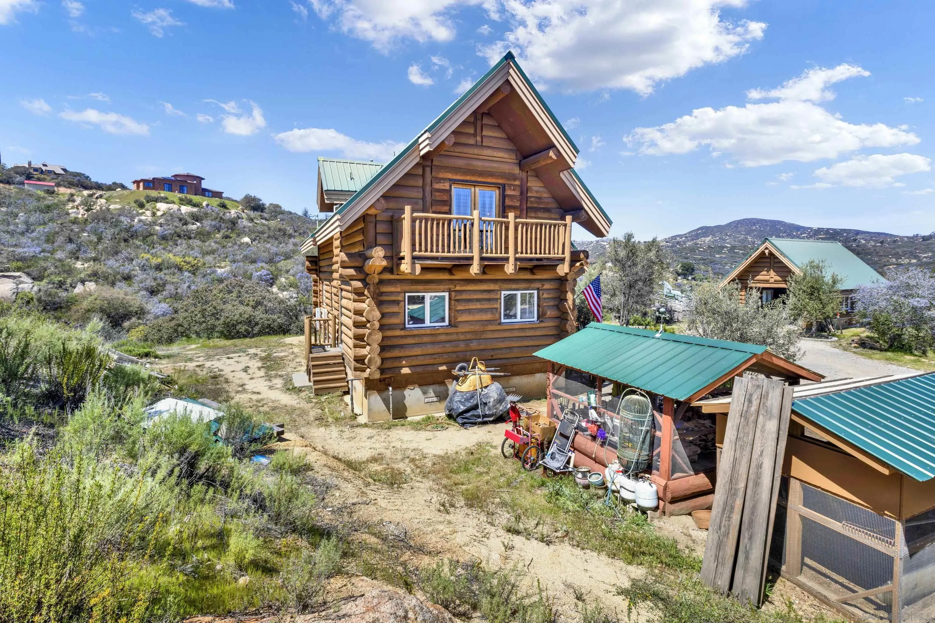 20580 Bexley Road Jamul, CA 91935 - Photo 43 of 50 a aerial view of a house with table and chairs