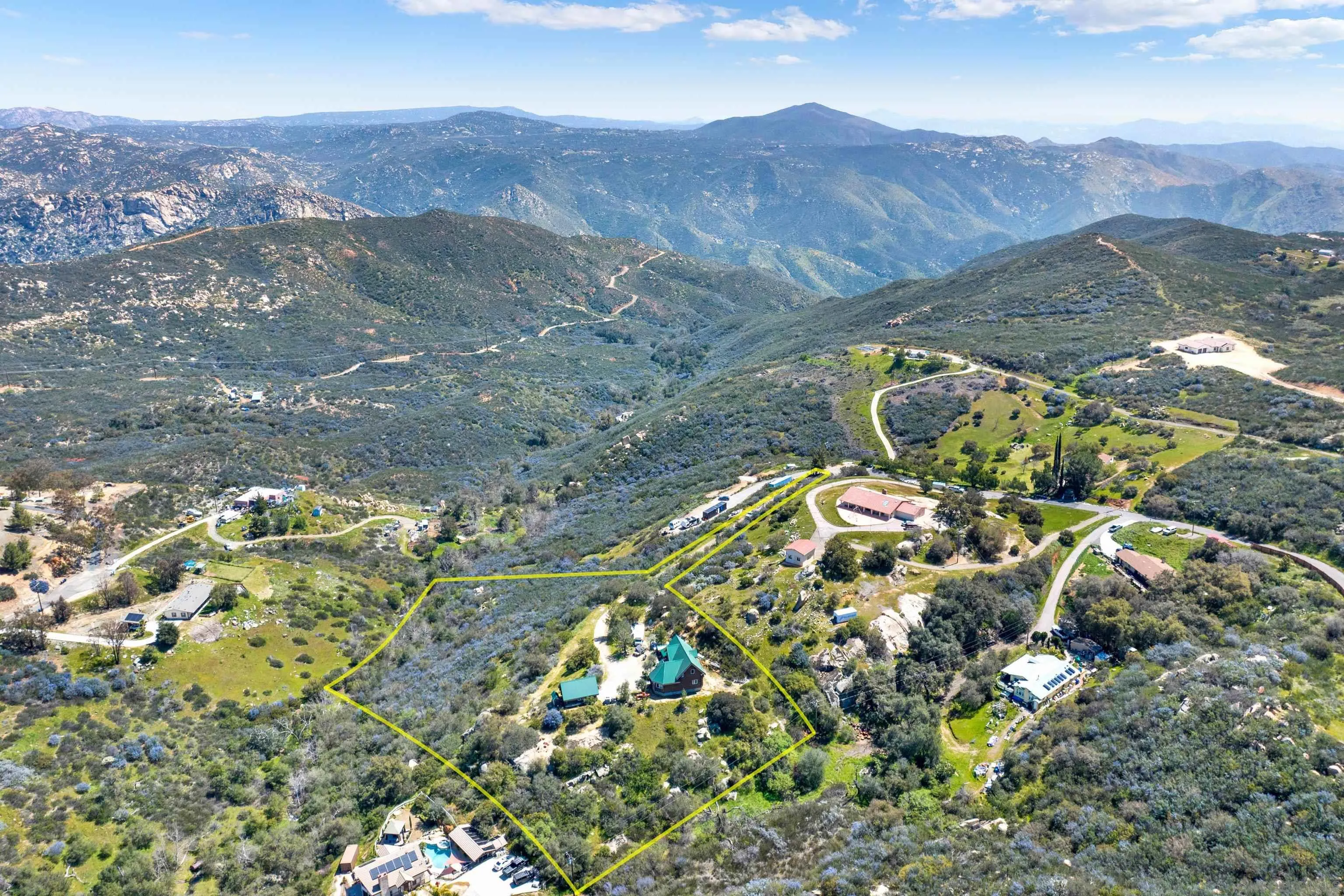 20580 Bexley Road Jamul, CA 91935 - Photo 49 of 50 a view of a lush green field with mountains in the background