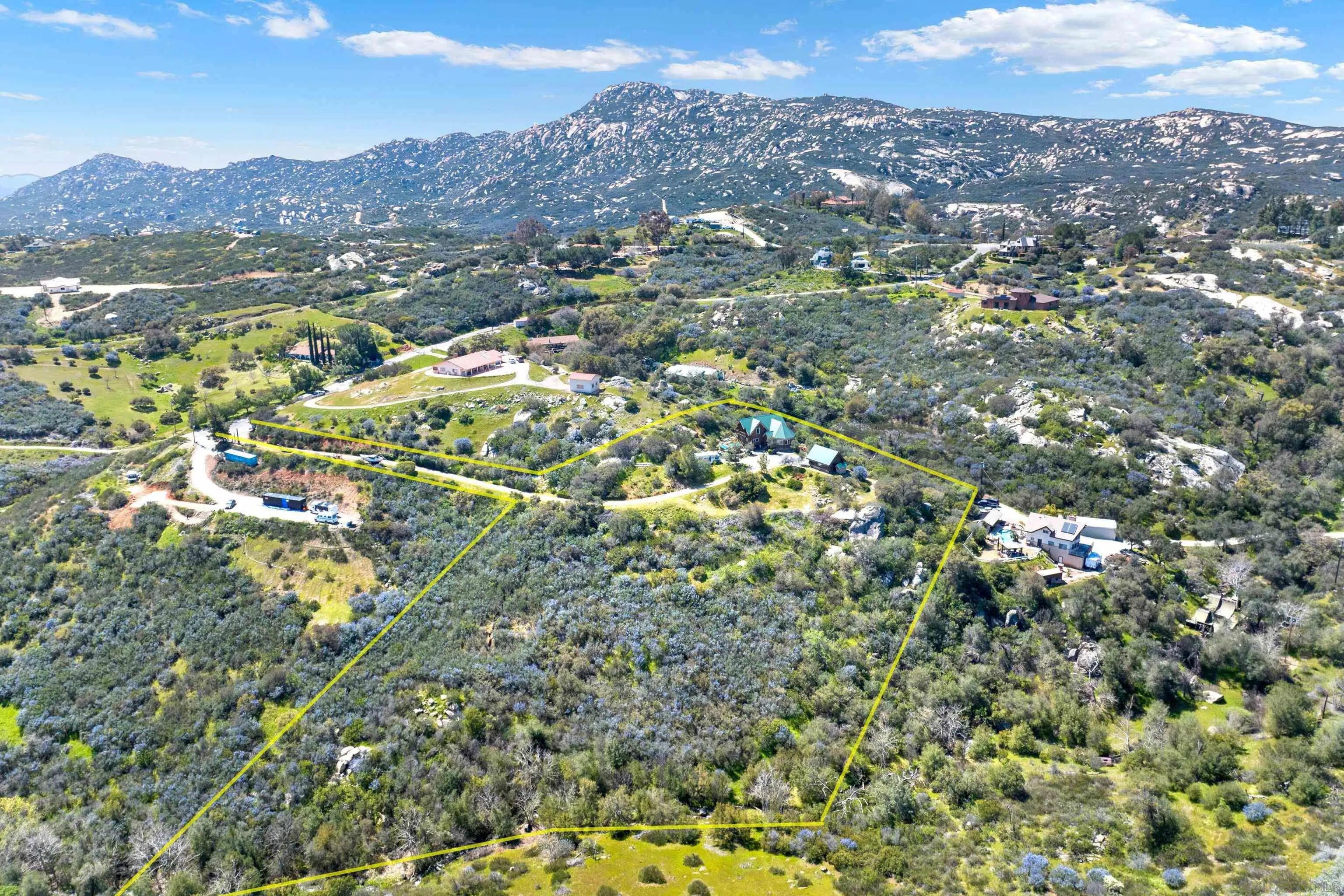 20580 Bexley Road Jamul, CA 91935 - Photo 50 of 50 an aerial view of residential houses with outdoor space and trees