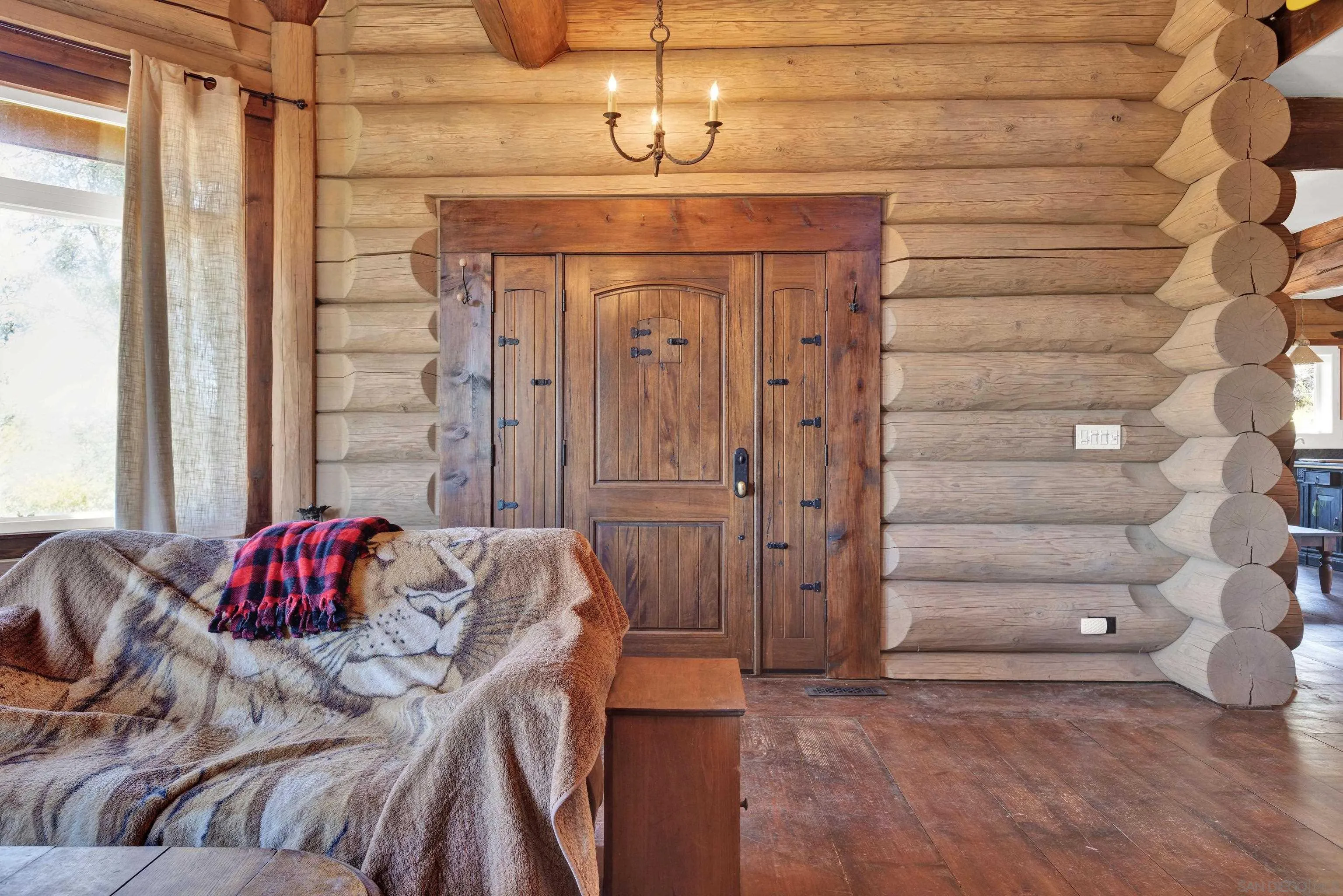 20580 Bexley Road Jamul, CA 91935 - Photo 10 of 50 a view of a bedroom with a bed and a window