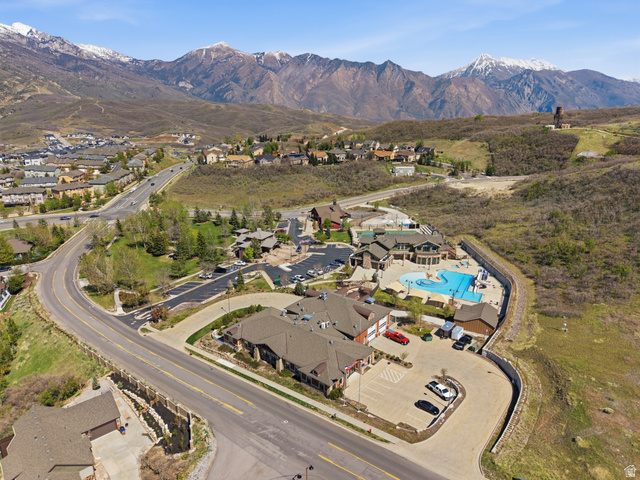 2007 Fielding Hill Lane Draper, UT 84020 - Photo 81 of 83 Expansive community amenities featuring multiple buildings with gabled roofs, a large outdoor swimming pool, and a winding road system