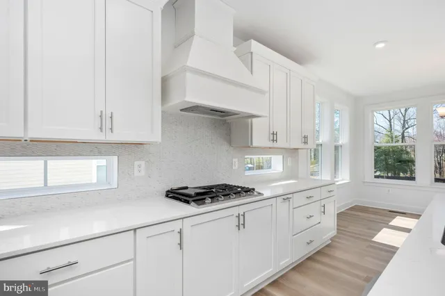 a bathroom with a toilet a sink and shower