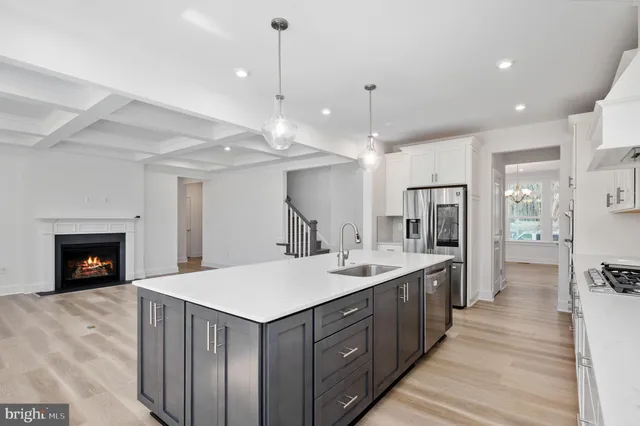 a bathroom with a sink and a window