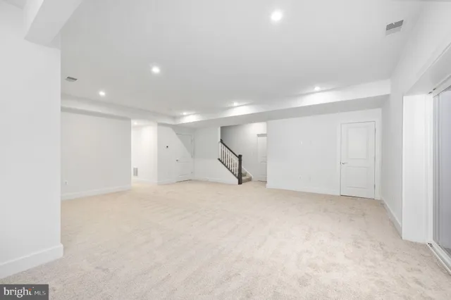 a white bath tub sitting in a bathroom