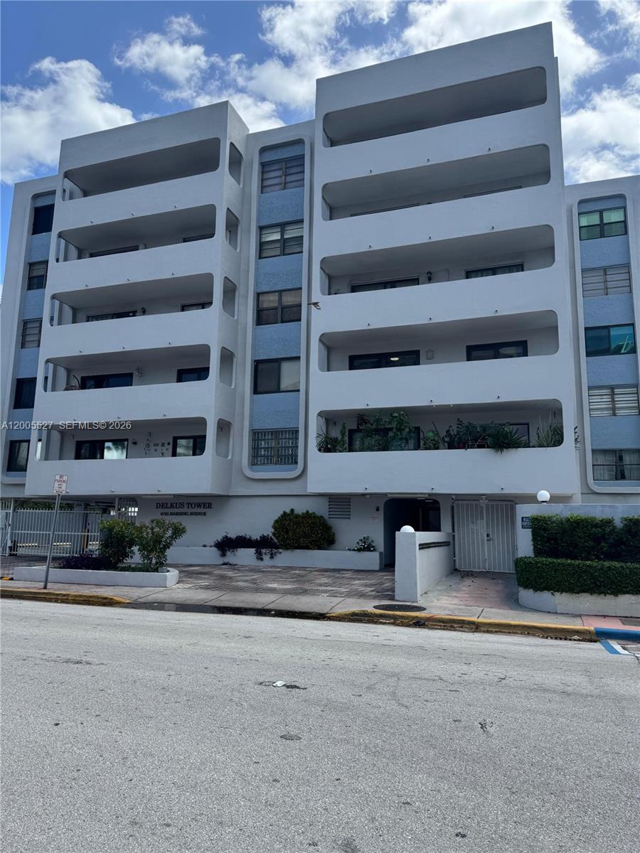 a front view of a building with large windows