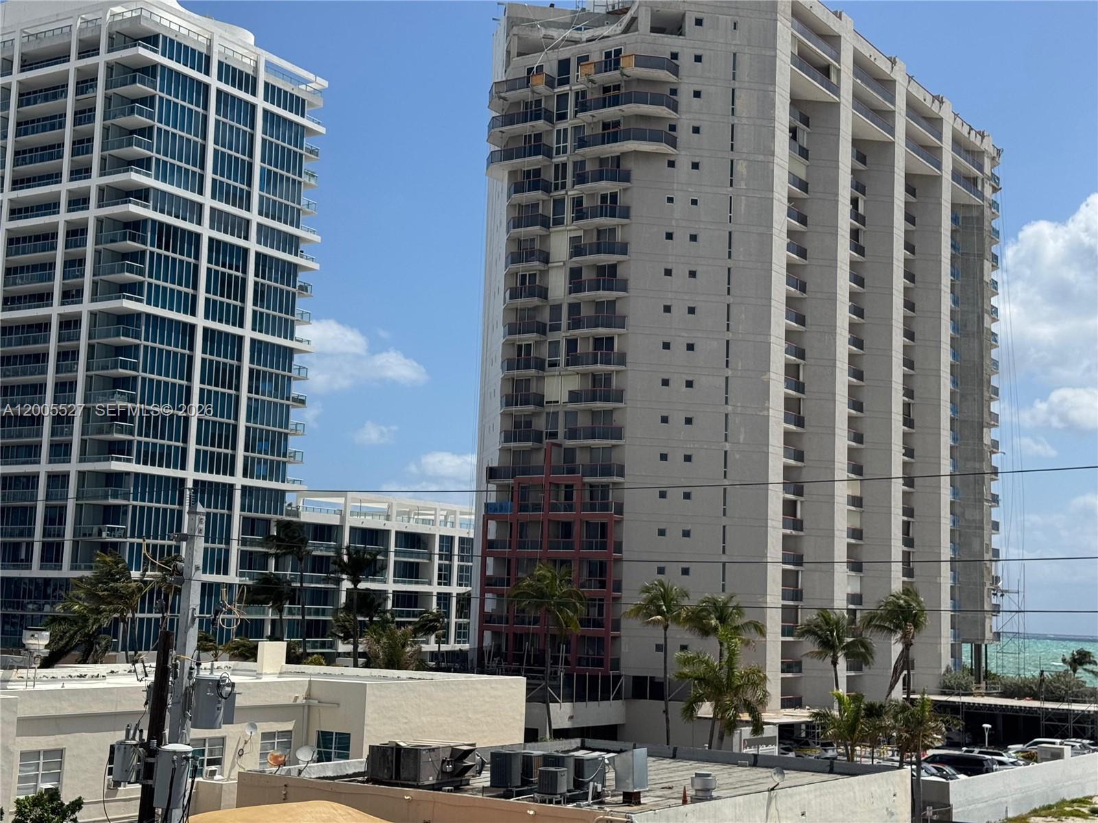 6725 Harding Avenue, Unit 503 Miami Beach, FL 33141 - Photo 18 of 23 a view of a building with a street