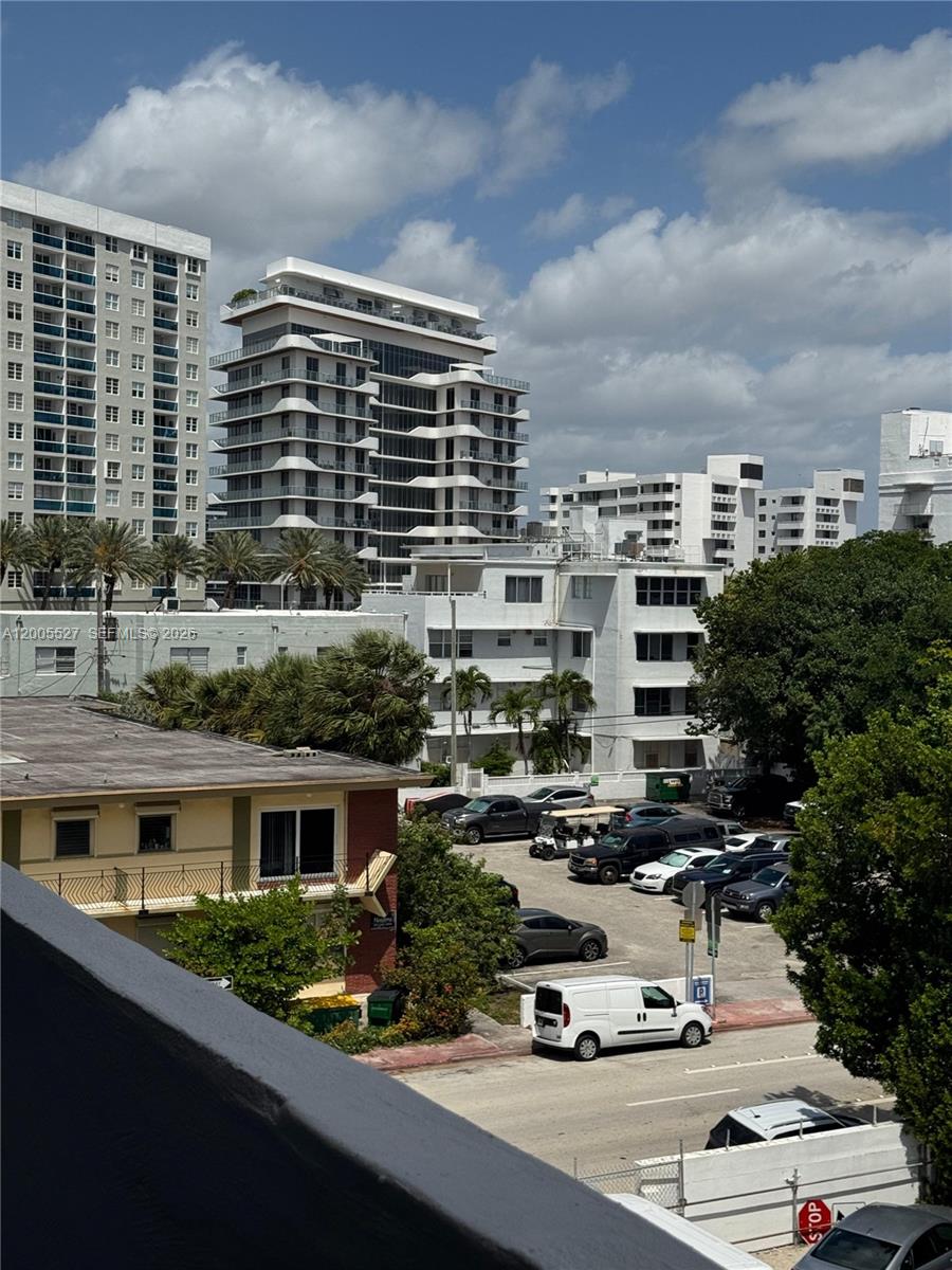 6725 Harding Avenue, Unit 503 Miami Beach, FL 33141 - Photo 19 of 23 a car parked in front of a building