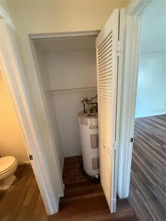 a bathroom with a sink and toilet