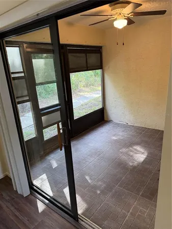 a view of an empty room with a window