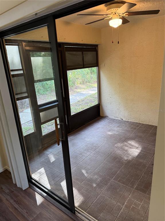 8013 Picketts Court, Unit 1 Spring Hill, FL 34613 - Photo 15 of 15 a view of an empty room with a window