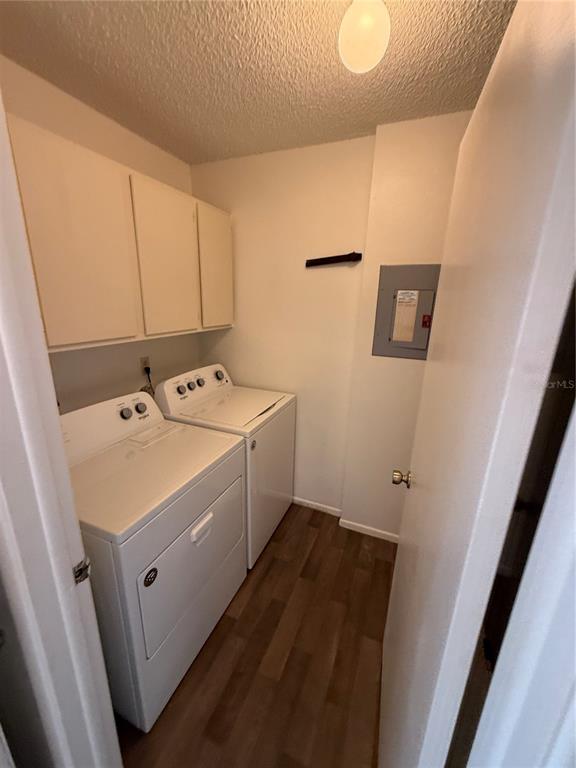 8013 Picketts Court, Unit 1 Spring Hill, FL 34613 - Photo 6 of 15 a utility room with dryer and washer