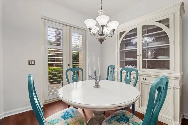 a kitchen with stainless steel appliances granite countertop a stove refrigerator and microwave