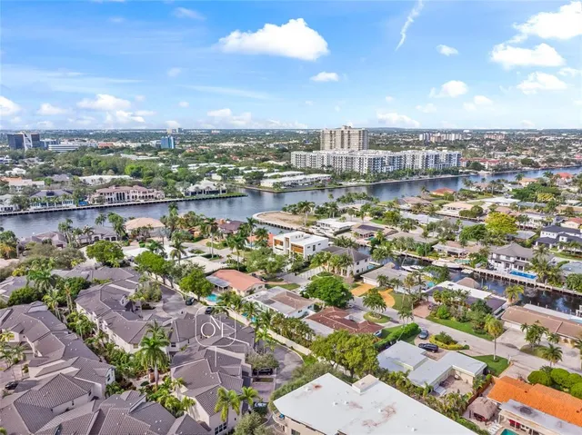 an aerial view of a city with lots of residential buildings