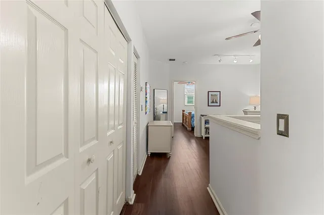 a bedroom with a bed and dresser