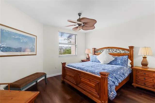 a bedroom with a bed and dresser